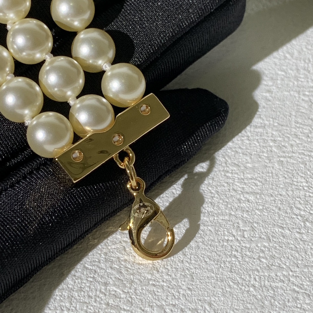 Chanel CC Turnlock Multi-Strand Pearl Bracelet bracelet Gold-tone metal cream white faux pearl 18cm