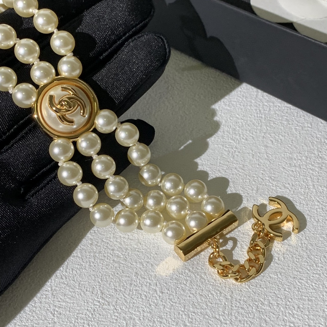 Chanel CC Turnlock Multi-Strand Pearl Bracelet bracelet Gold-tone metal cream white faux pearl 18cm