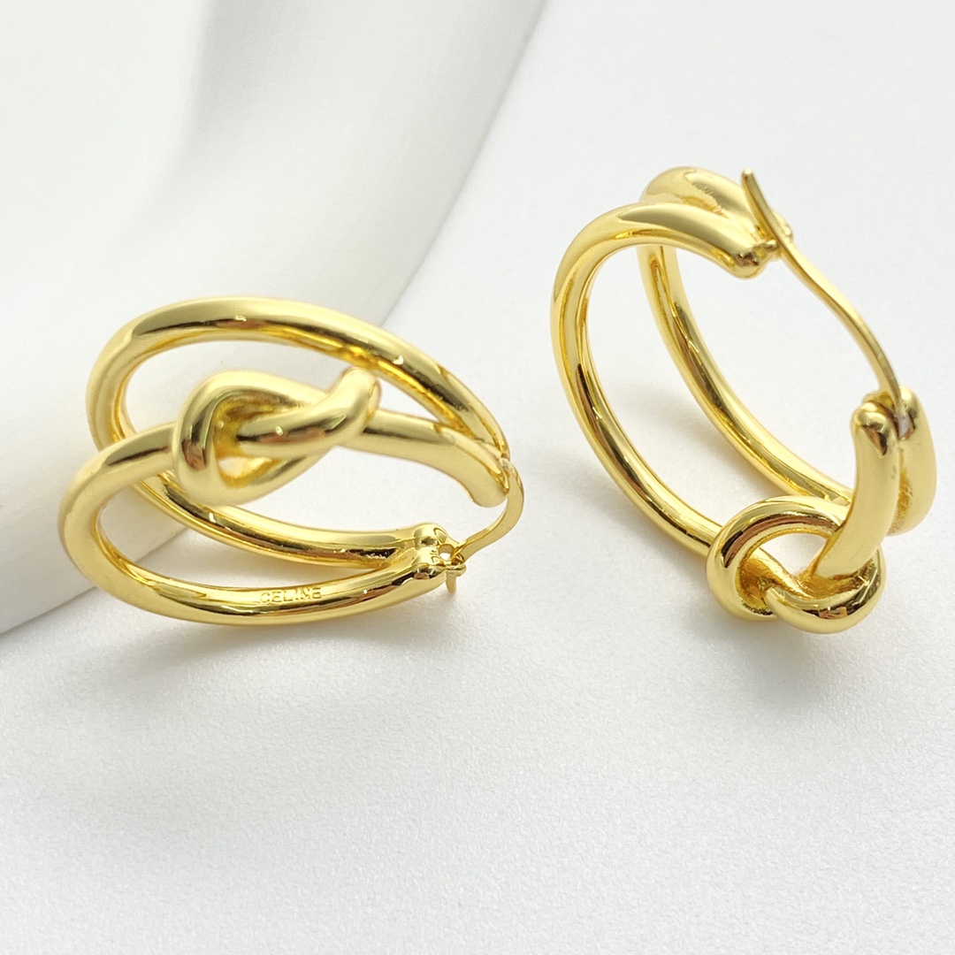 Celine Knot Double Hoop earrings gold tone metal no gemstones 2 5cm diameter