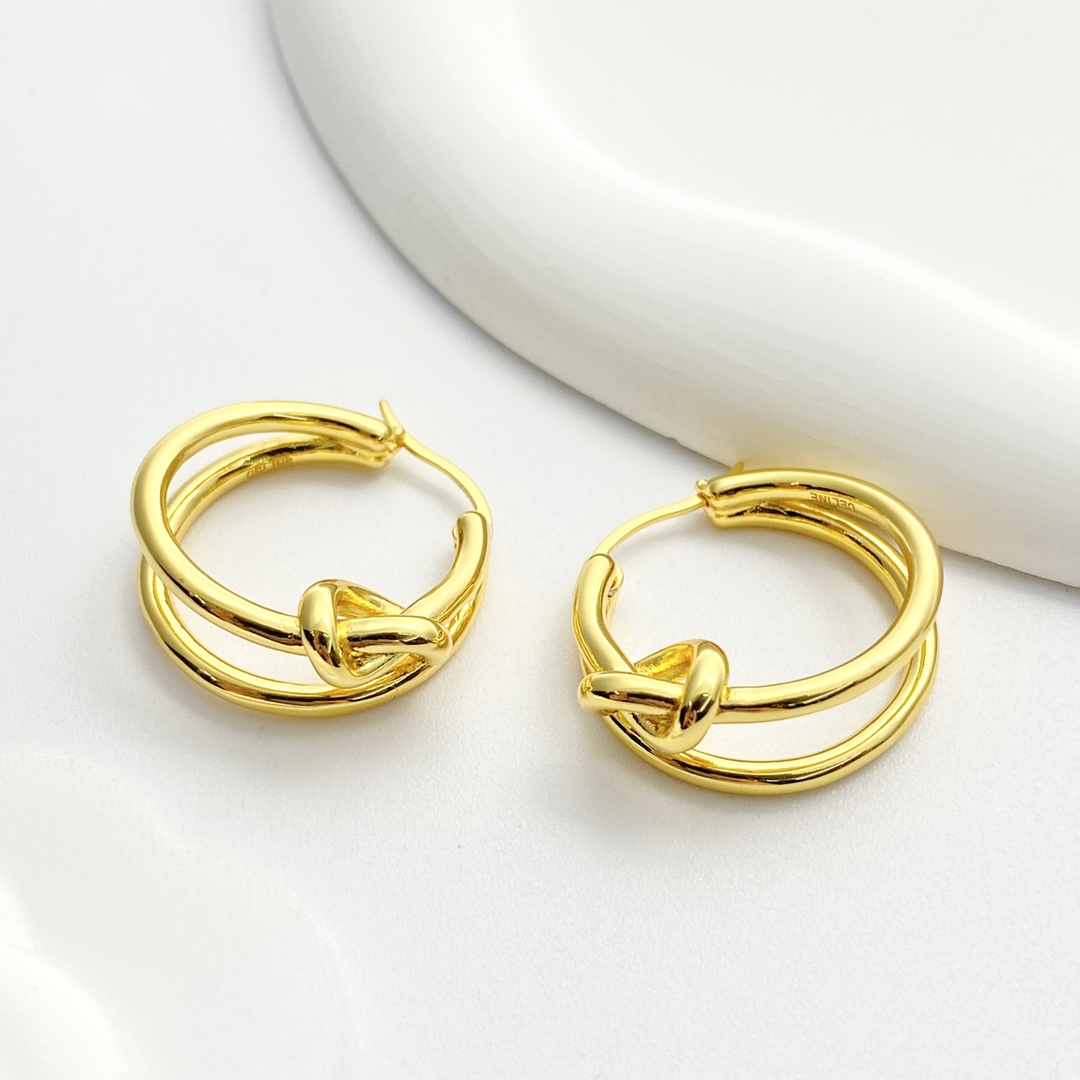 Celine Knot Double Hoop earrings gold tone metal no gemstones 2 5cm diameter