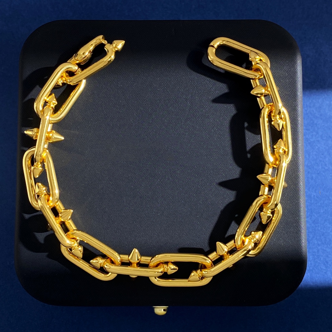 Tiffany Tiffany Titan by Pharrell Williams bracelet polished gold-tone metal polished silver-tone metal no gemstones 7 inches