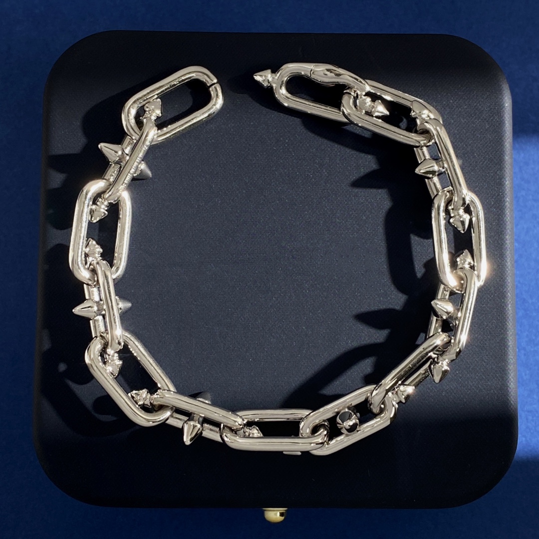 Tiffany Tiffany Titan by Pharrell Williams bracelet polished gold-tone metal polished silver-tone metal no gemstones 7 inches