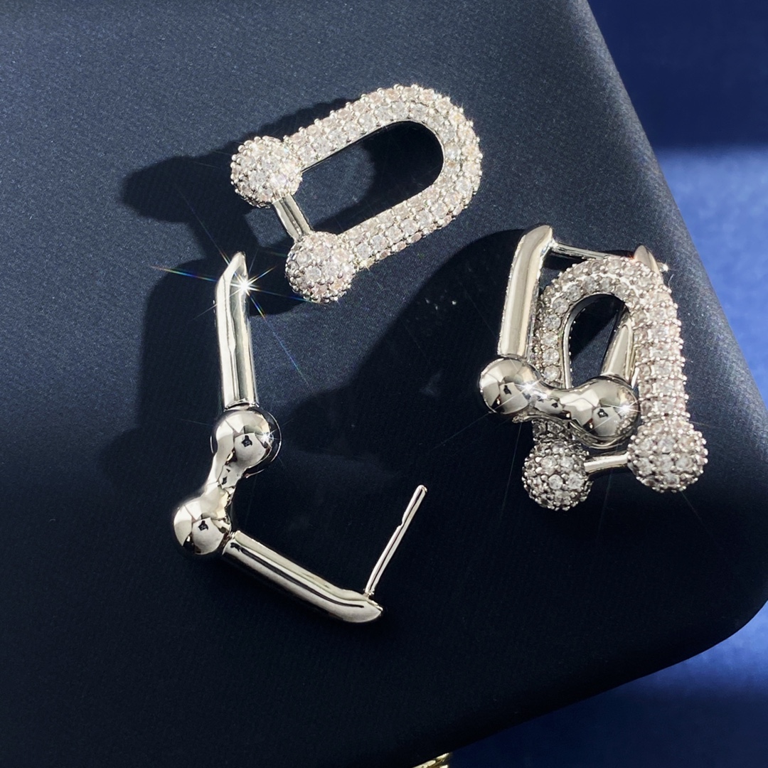 Tiffany HardWear earrings Gold-tone metal with clear pave stones Silver-tone metal with clear pave stones 3 2cm drop length