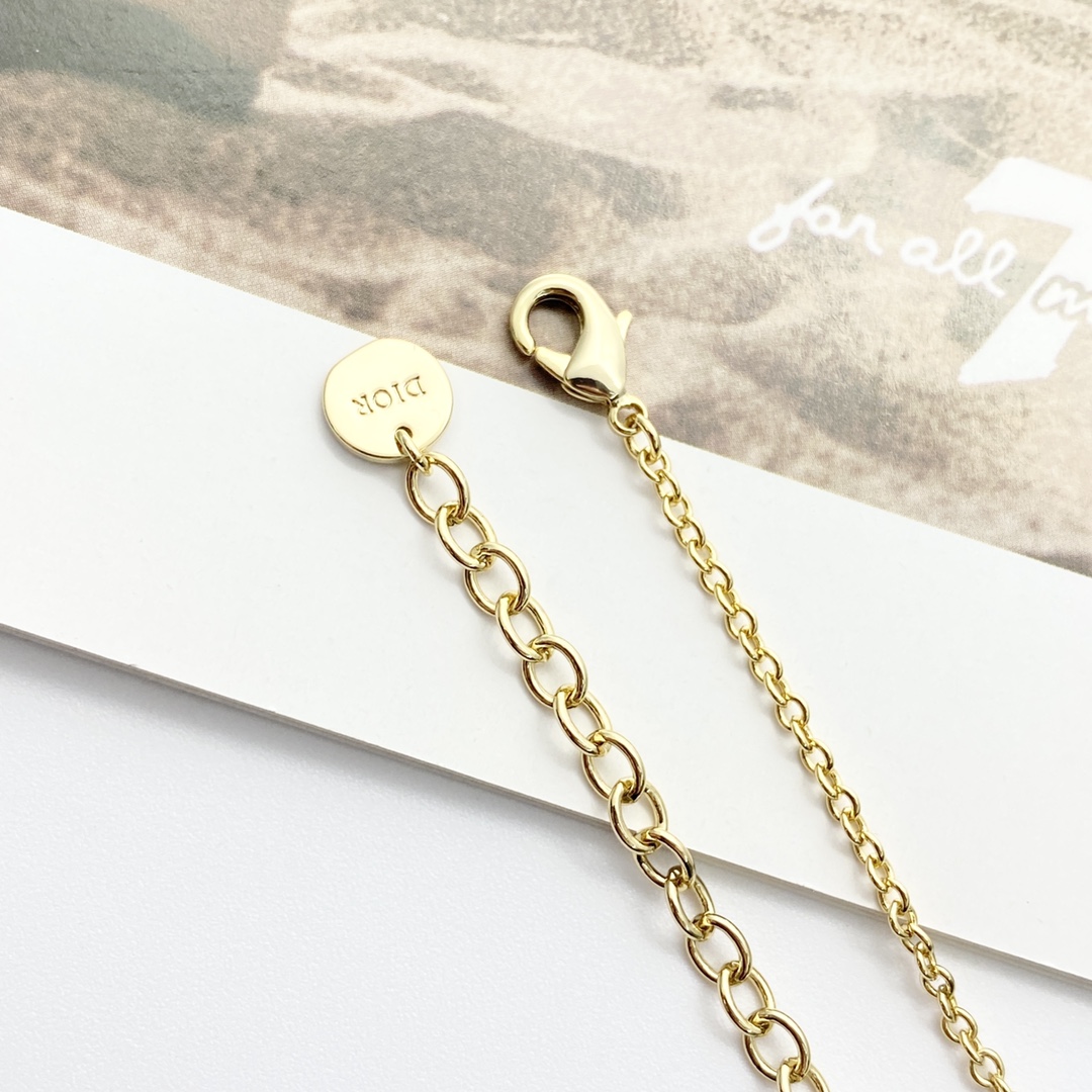 Dior Dio r evolution necklace gold-tone metal white faux pearl clear crystal 42cm with 5cm extender