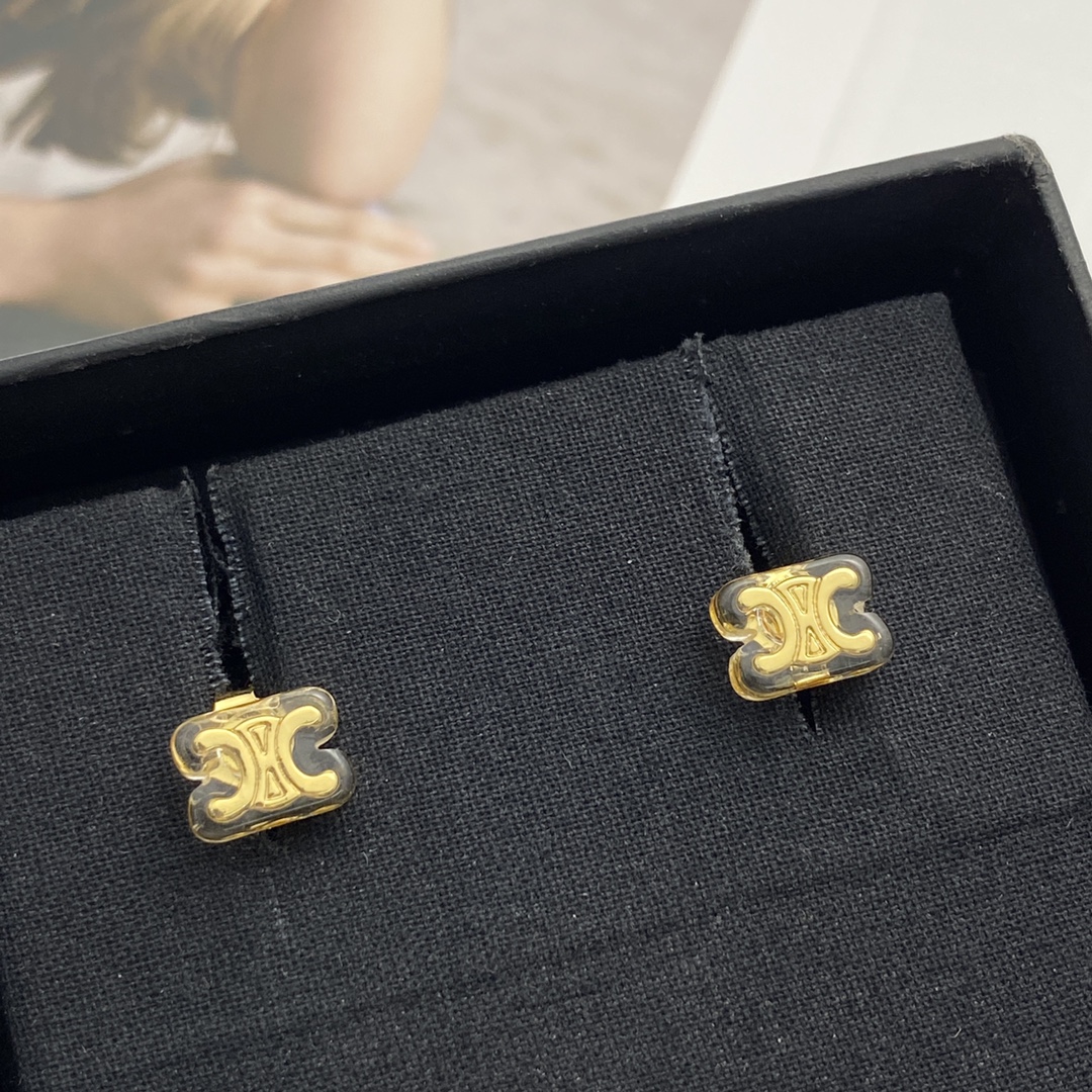 Celine Triomphe earrings gold-tone metal with clear transparent resin 1cm stud diameter