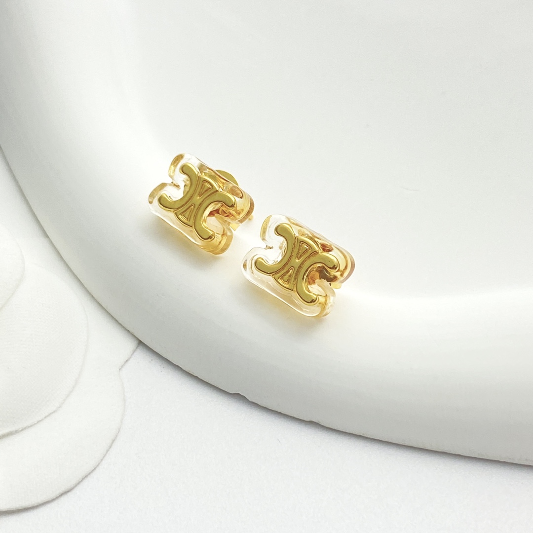 Celine Triomphe earrings gold-tone metal with clear transparent resin 1cm stud diameter