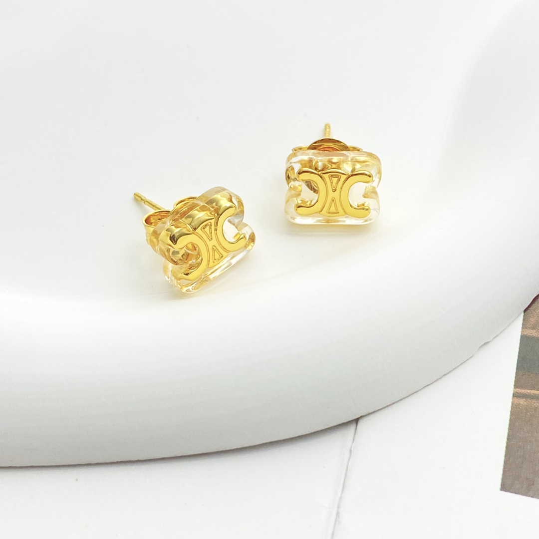Celine Triomphe earrings gold-tone metal with clear transparent resin 1cm stud diameter