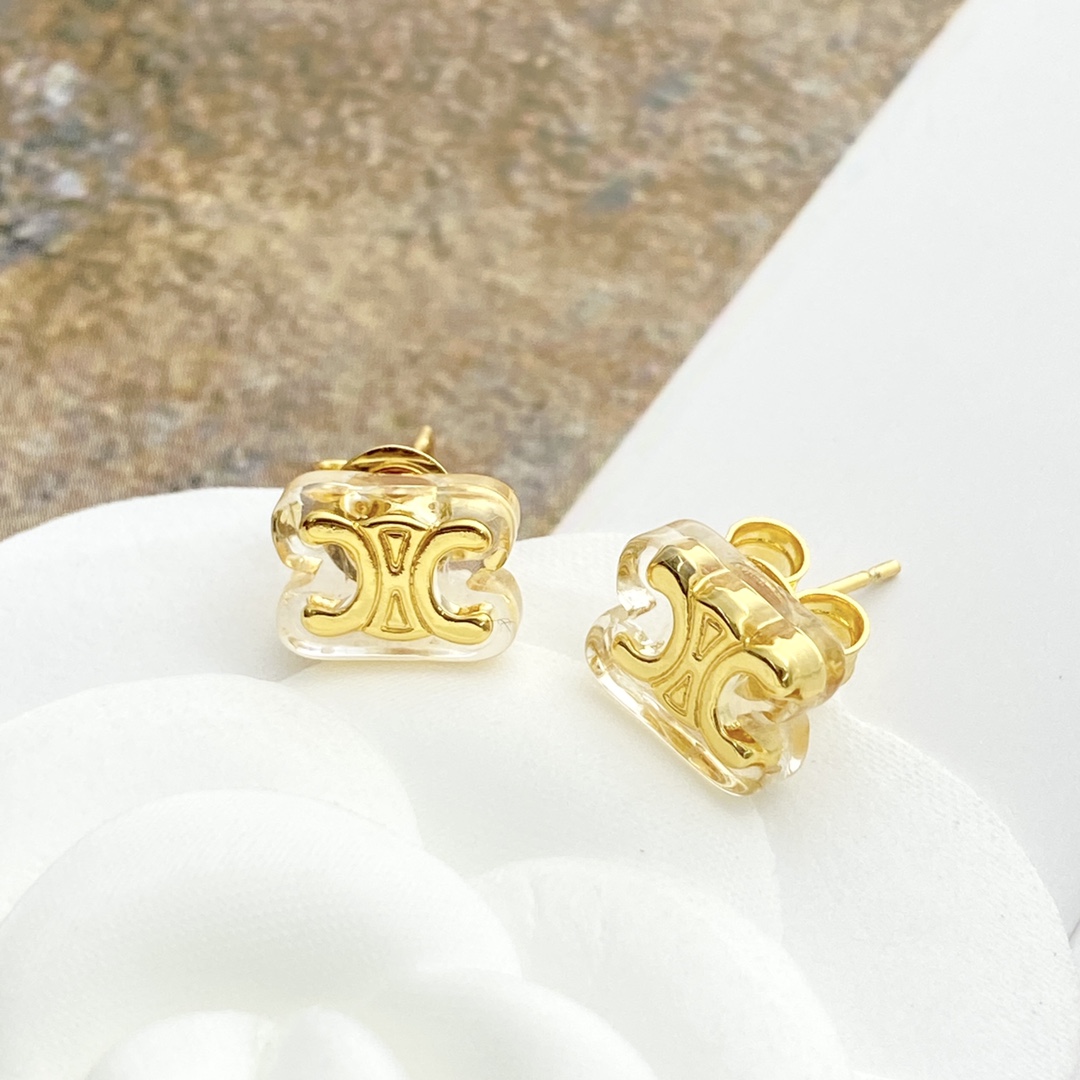 Celine Triomphe earrings gold-tone metal with clear transparent resin 1cm stud diameter