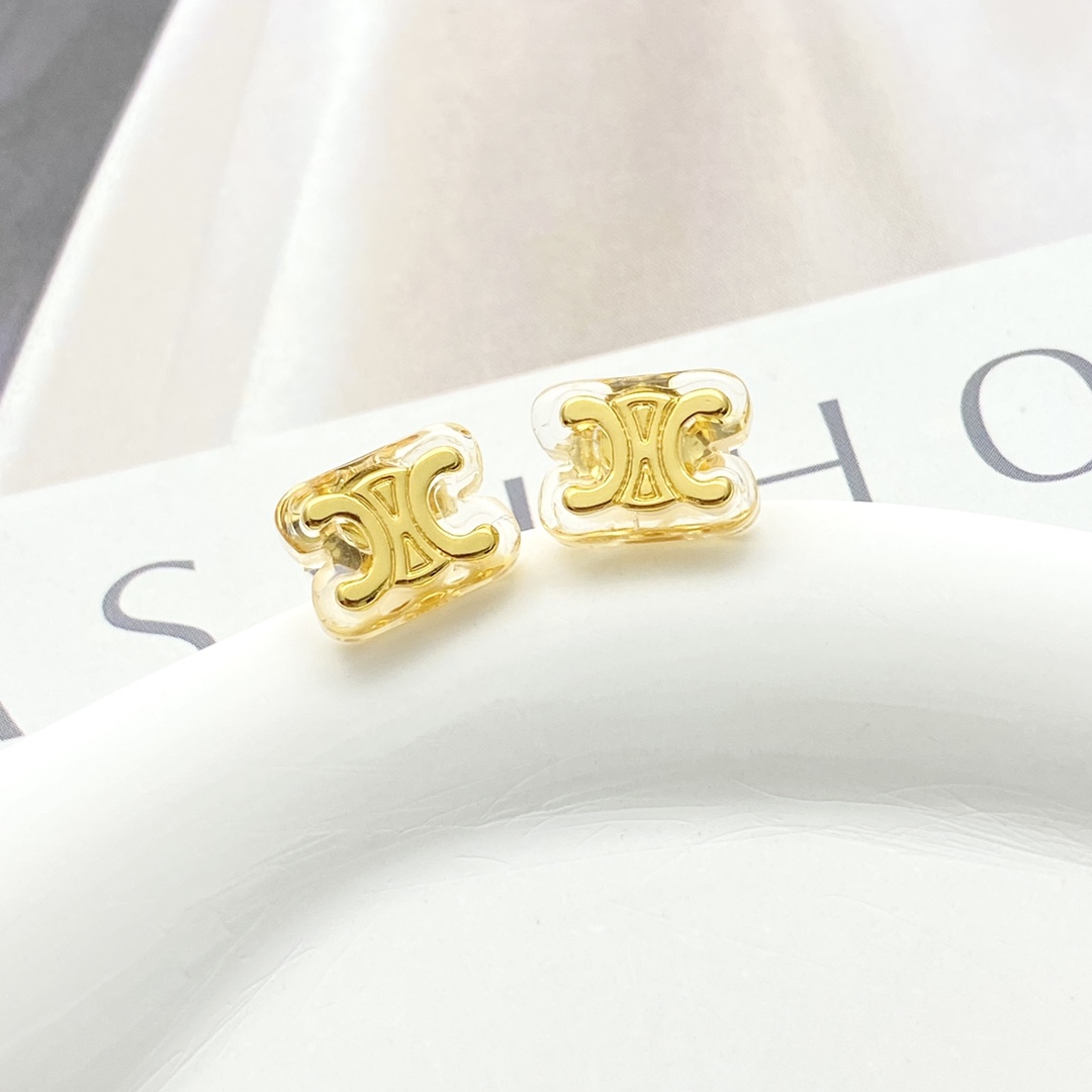 Celine Triomphe earrings gold-tone metal with clear transparent resin 1cm stud diameter