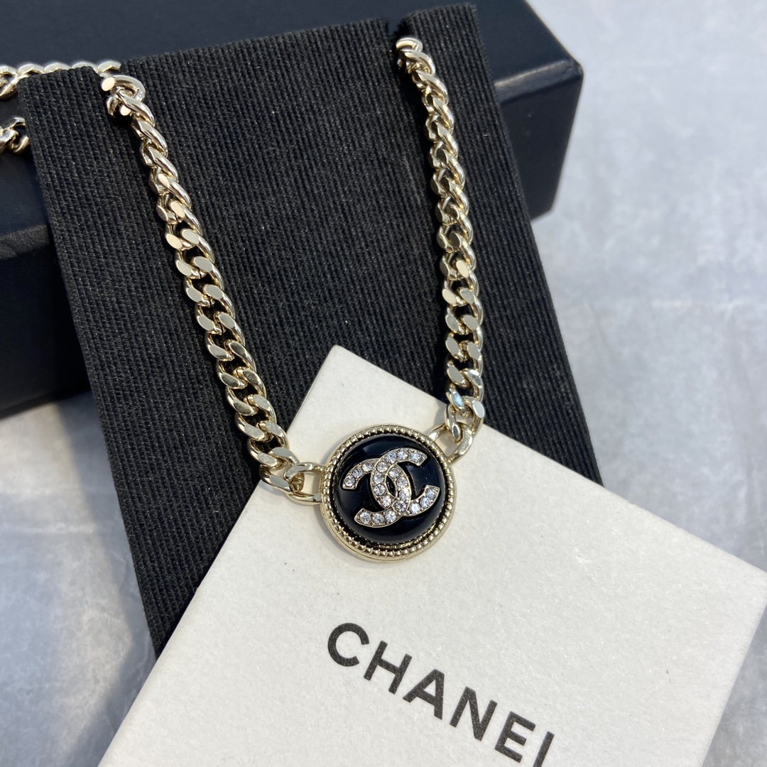 Chanel CC Logo Bijoux Fantaisie Choker necklace Light gold-tone metal black enamel clear crystal accents 40cm with 5cm extender