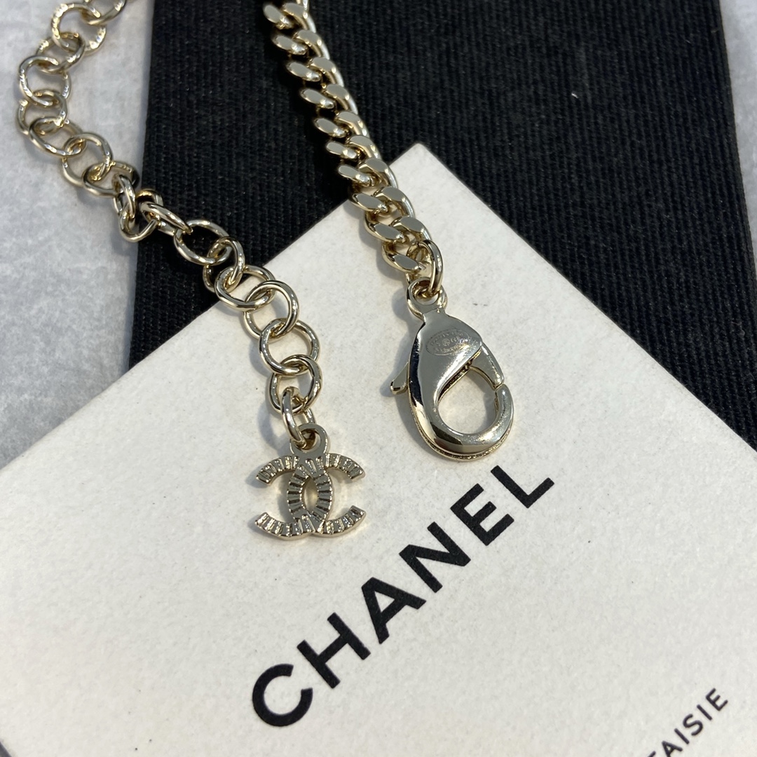 Chanel CC Logo Bijoux Fantaisie Choker necklace Light gold-tone metal black enamel clear crystal accents 40cm with 5cm extender
