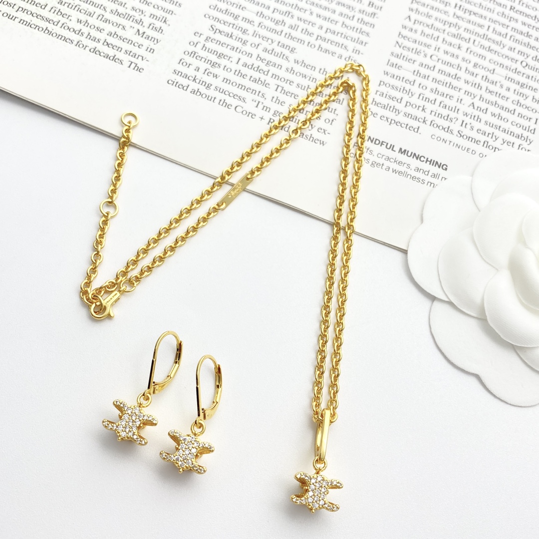 Celine Triomphe earrings gold-tone metal with clear pave crystals 2 5cm drop length