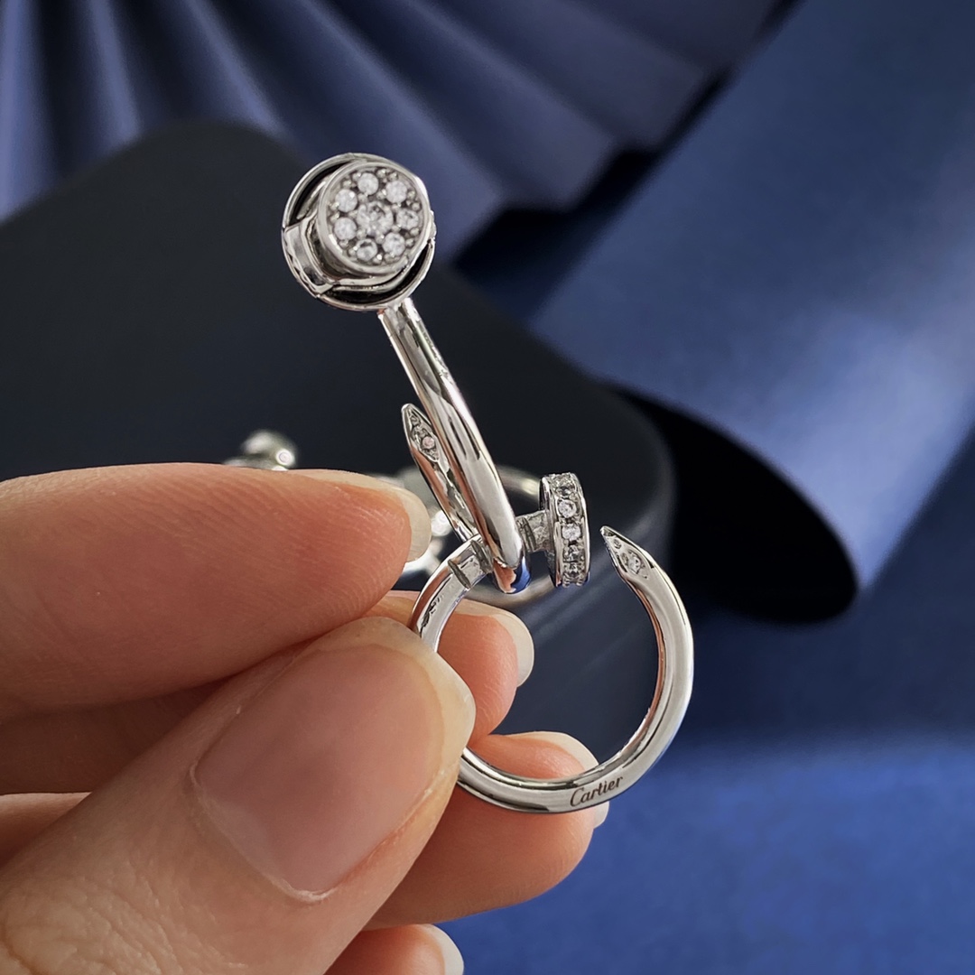Cartier Juste un Clou earrings Silver-toned metal with clear diamond accents One Size
