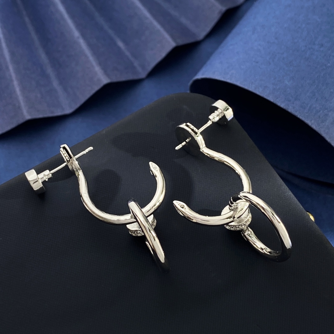 Cartier Juste un Clou earrings Silver-toned metal with clear diamond accents One Size