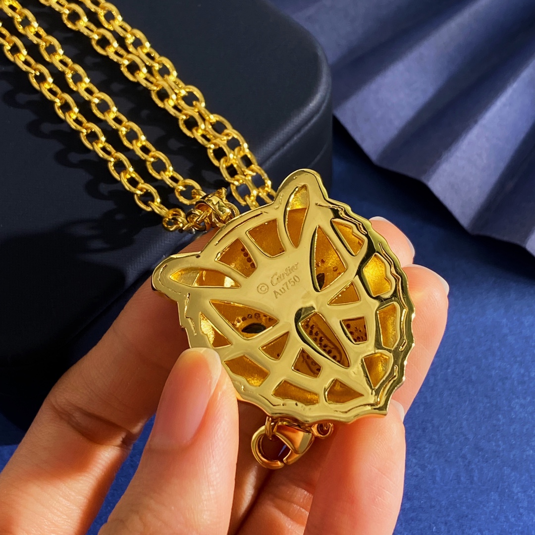Cartier Panthere de Cartier Tiger Head Pendant necklace Yellow gold with black enamel pave-set clear diamonds and green gemstone eyes 60cm