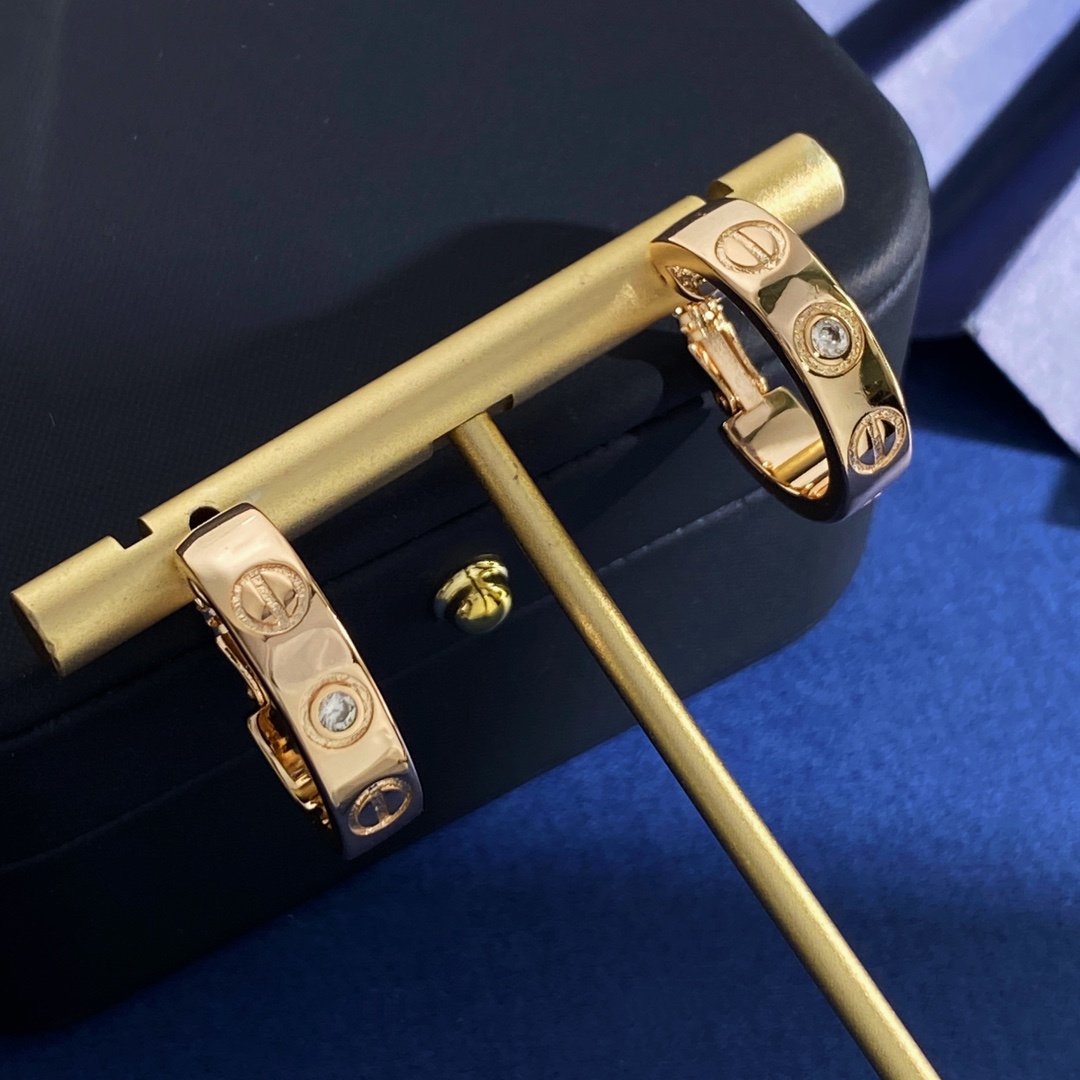 Cartier LOVE earrings 18K yellow gold 18K white gold 18K rose gold with clear diamond accents 13mm hoop diameter