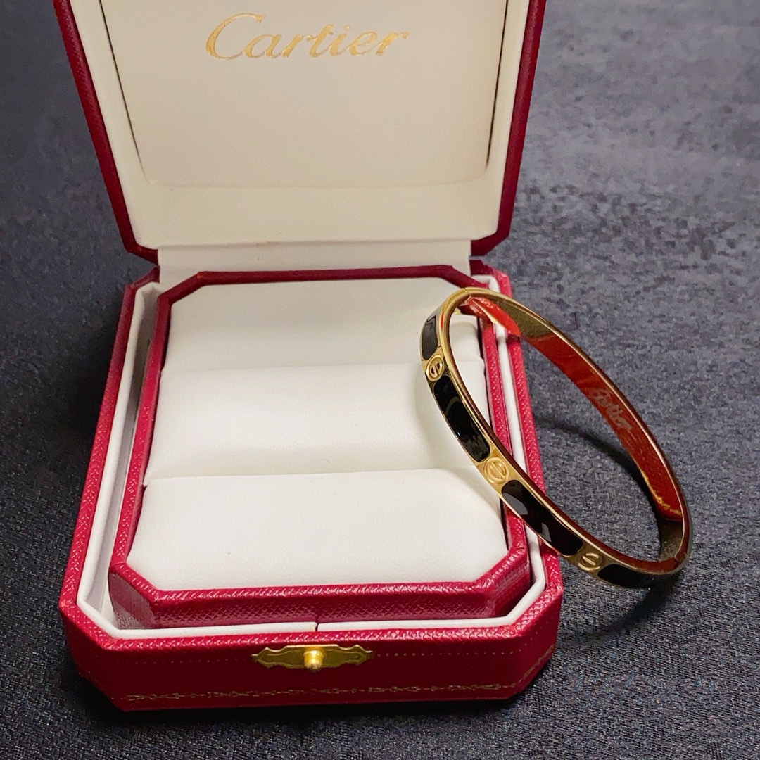 Cartier Love bracelet 18k yellow gold with black lacquer inlay 17
