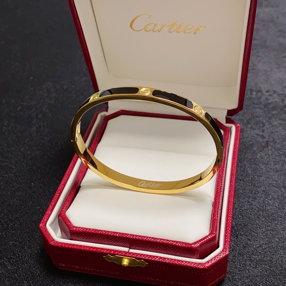 Cartier Love bracelet 18k yellow gold with black lacquer inlay 17