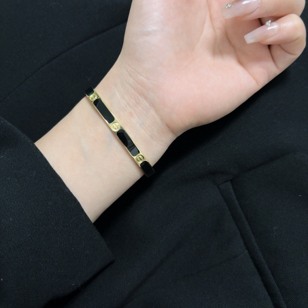 Cartier Love bracelet 18k yellow gold with black lacquer inlay 17