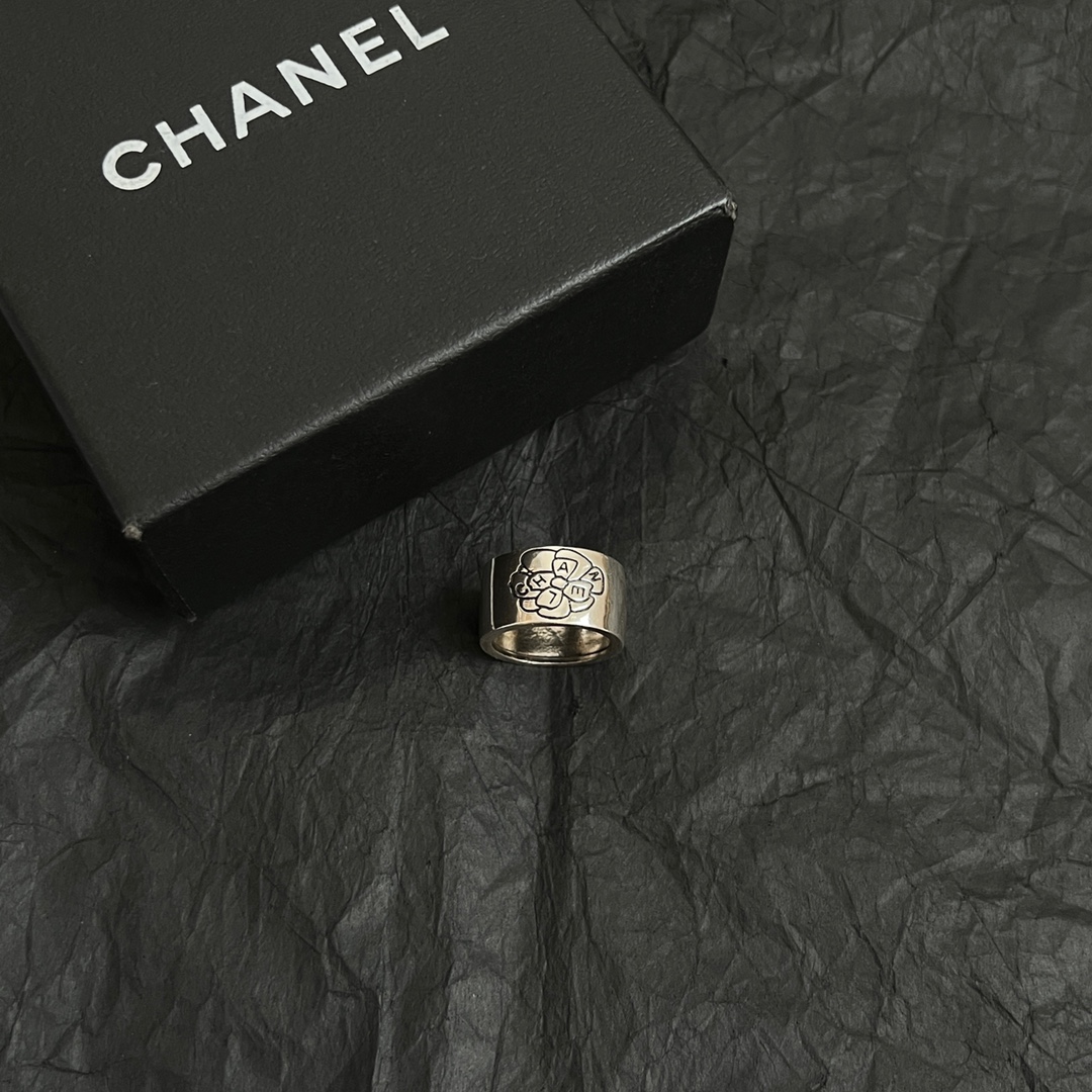 Chanel Camellia Logo Wide Band Ring ring Silver-toned metal with black engraved detailing US 7