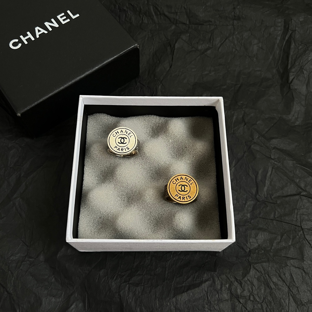 Chanel CC Logo Paris Medallion Signet Ring ring Antique gold-tone metal with black enamel detailing US 7