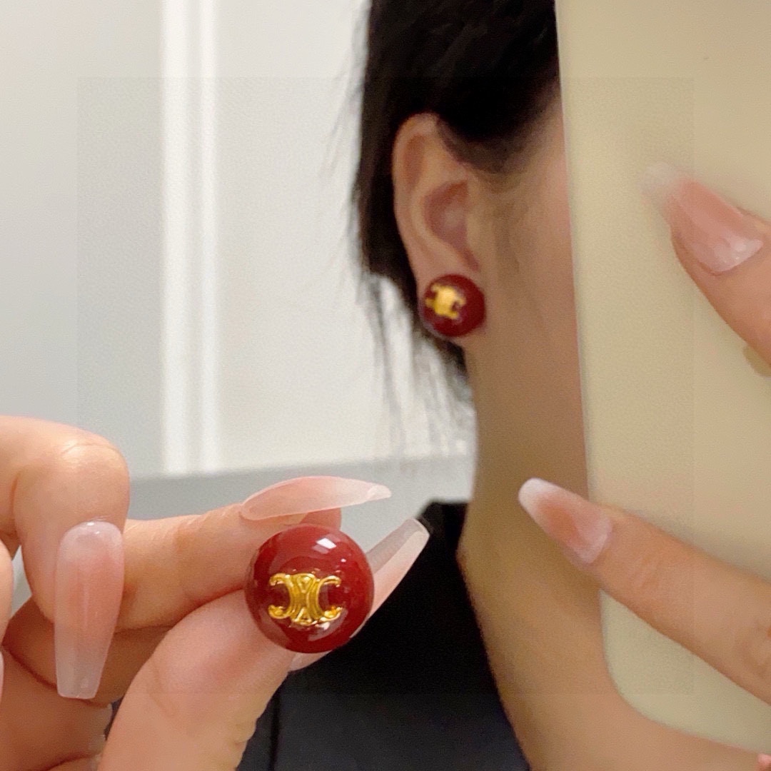 Celine Triomphe earrings gold-tone metal deep red resin 1 5cm diameter