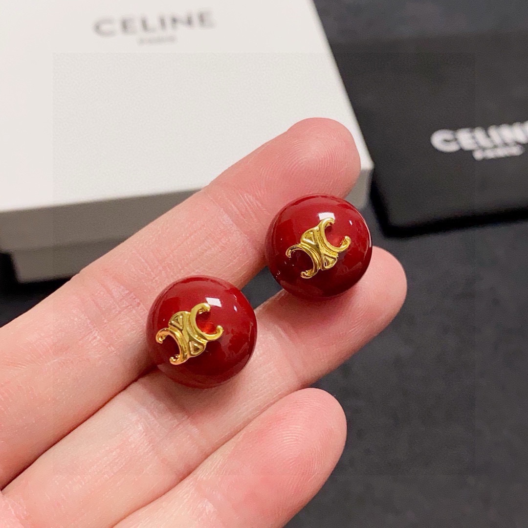 Celine Triomphe earrings gold-tone metal deep red resin 1 5cm diameter