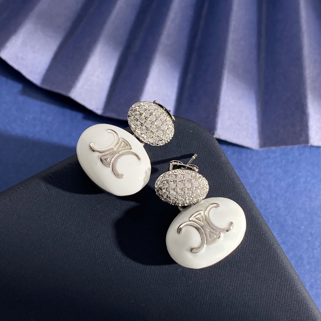 Celine Triomphe Enamel Pave Drop Earrings earrings Gold-tone metal with white enamel and clear pave crystals Silver-tone metal with white black or pink enamel and clear pave crystals One Size