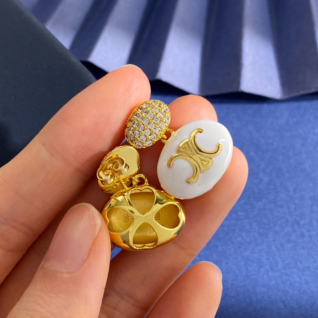 Celine Triomphe Enamel Pave Drop Earrings earrings Gold-tone metal with white enamel and clear pave crystals Silver-tone metal with white black or pink enamel and clear pave crystals One Size