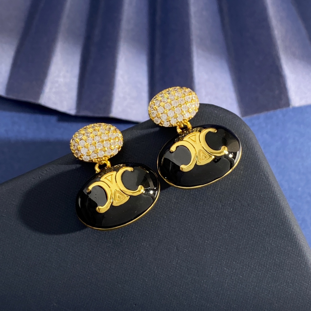 Celine Triomphe Enamel Pave Drop Earrings earrings Gold-tone metal with white enamel and clear pave crystals Silver-tone metal with white black or pink enamel and clear pave crystals One Size
