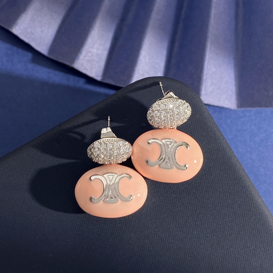Celine Triomphe Enamel Pave Drop Earrings earrings Gold-tone metal with white enamel and clear pave crystals Silver-tone metal with white black or pink enamel and clear pave crystals One Size