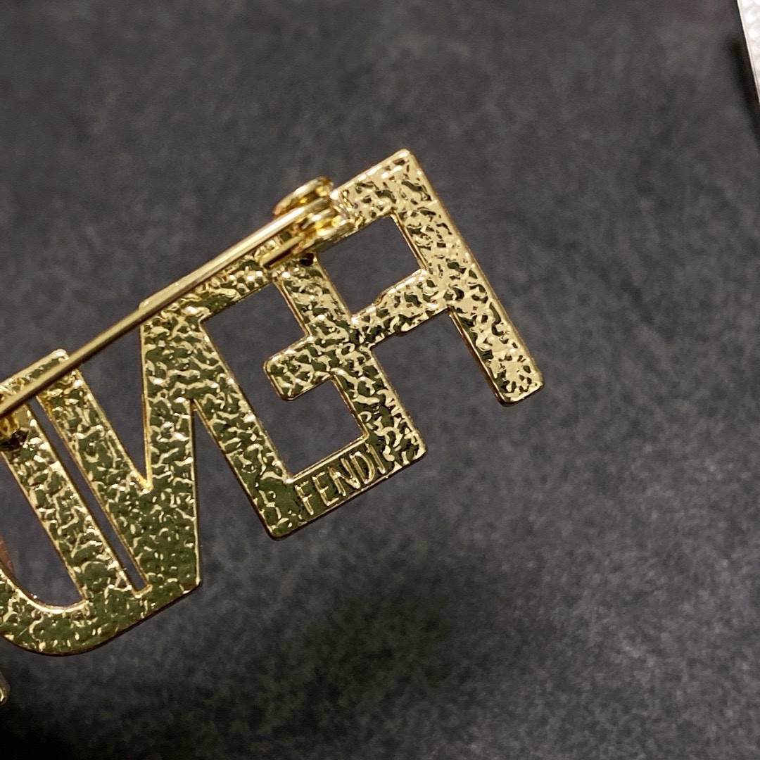 Fendi Fendi Logo Letter Brooch brooch gold-tone metal with clear crystal pave silver-tone metal with clear crystal pave 3 5cm width