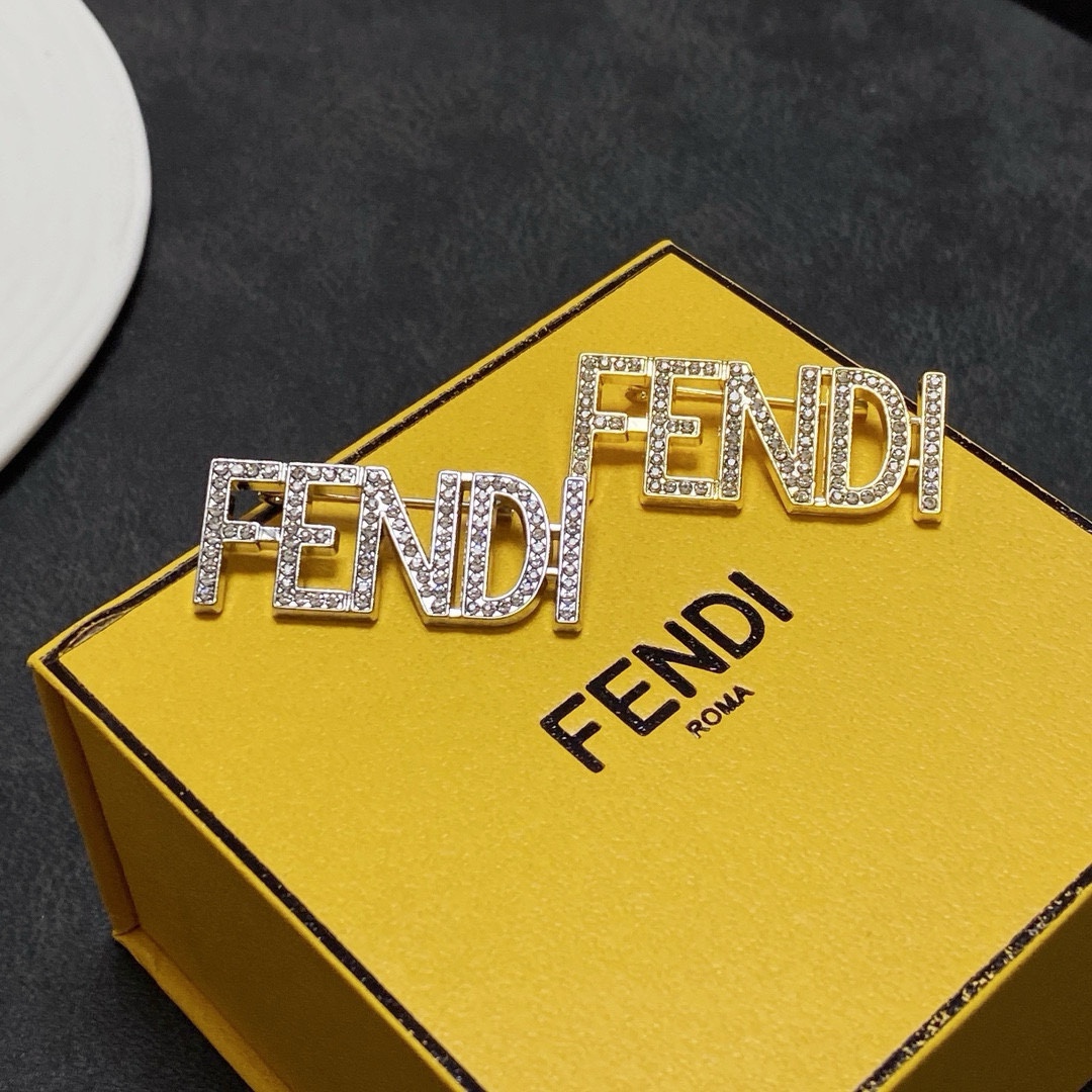Fendi Fendi Logo Letter Brooch brooch gold-tone metal with clear crystal pave silver-tone metal with clear crystal pave 3 5cm width