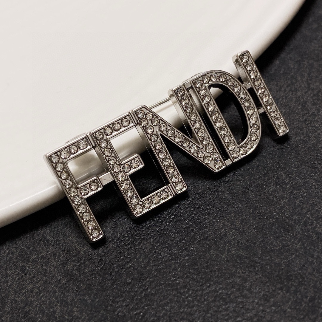 Fendi Fendi Logo Letter Brooch brooch gold-tone metal with clear crystal pave silver-tone metal with clear crystal pave 3 5cm width