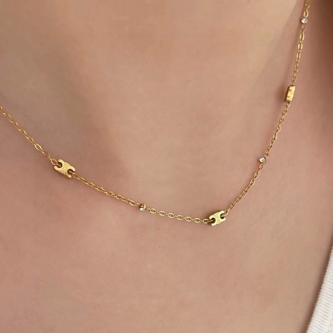 Celine Triomphe necklace gold-tone metal with clear crystal accents 40cm