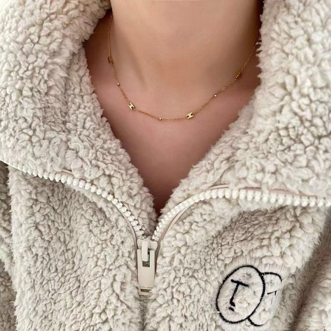 Celine Triomphe necklace gold-tone metal with clear crystal accents 40cm