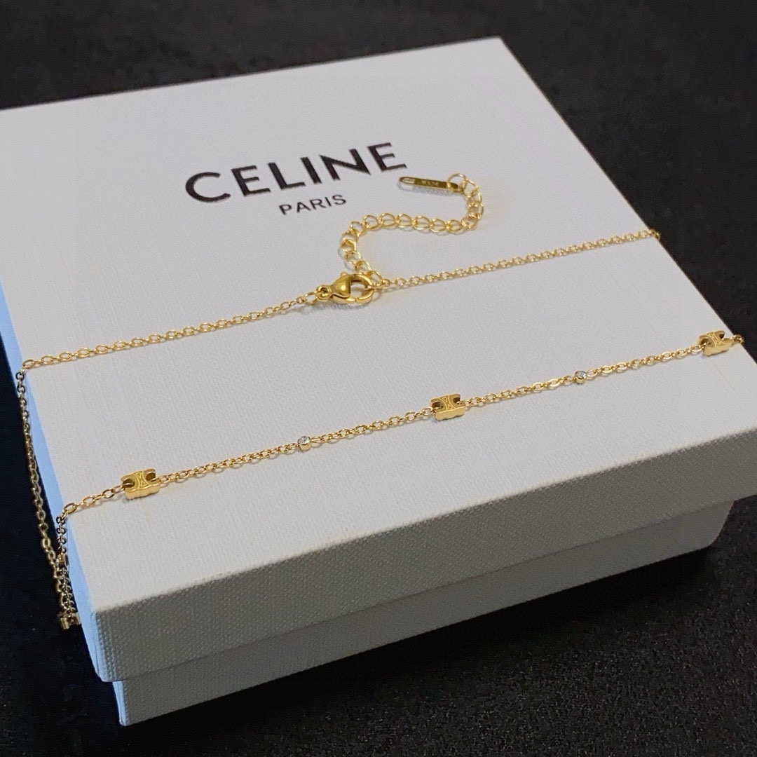 Celine Triomphe necklace gold-tone metal with clear crystal accents 40cm
