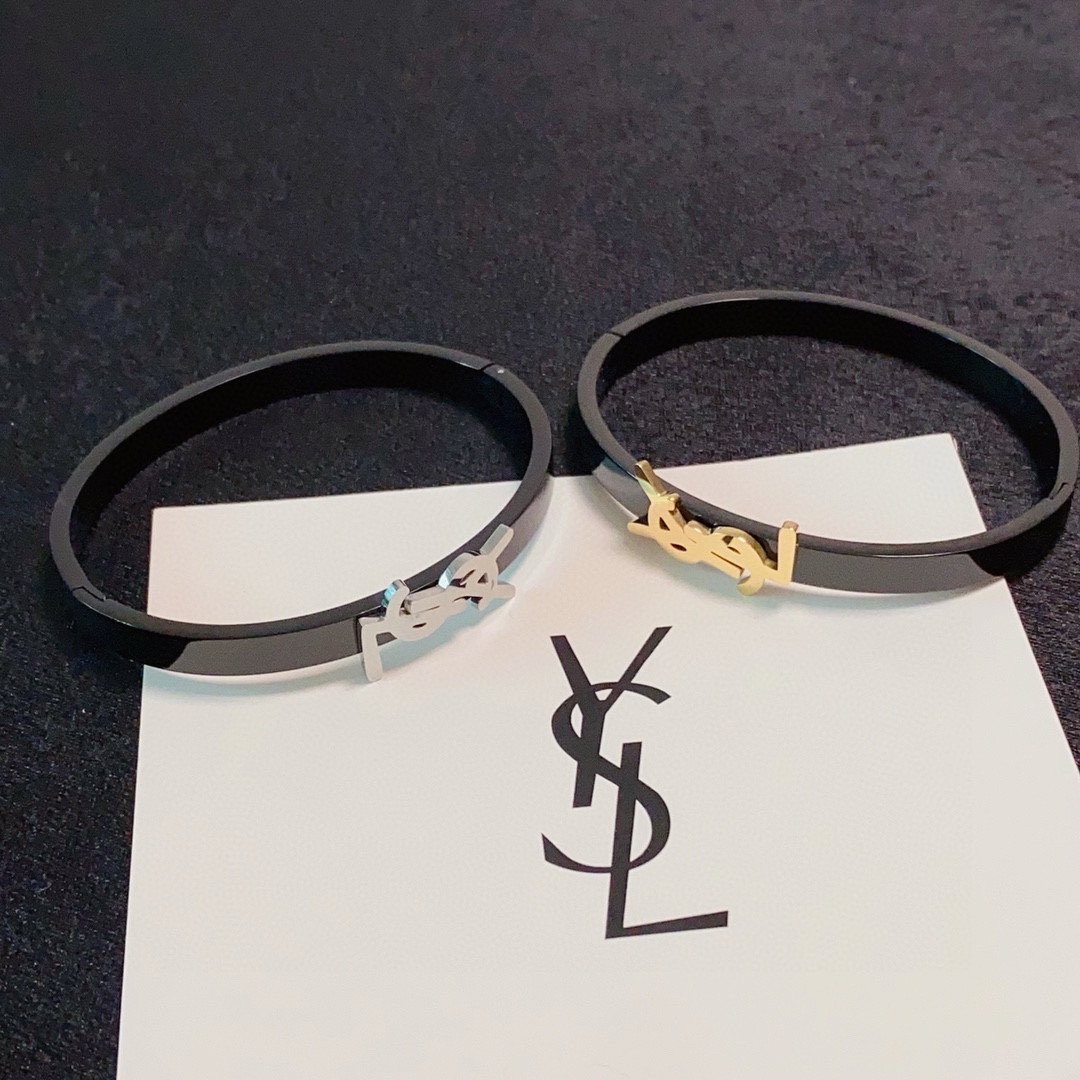 Saint Laurent Cassandre YSL Monogram Bangle bracelet black enamel with gold-tone metal logo black enamel with silver-tone metal logo 17cm inner circumference