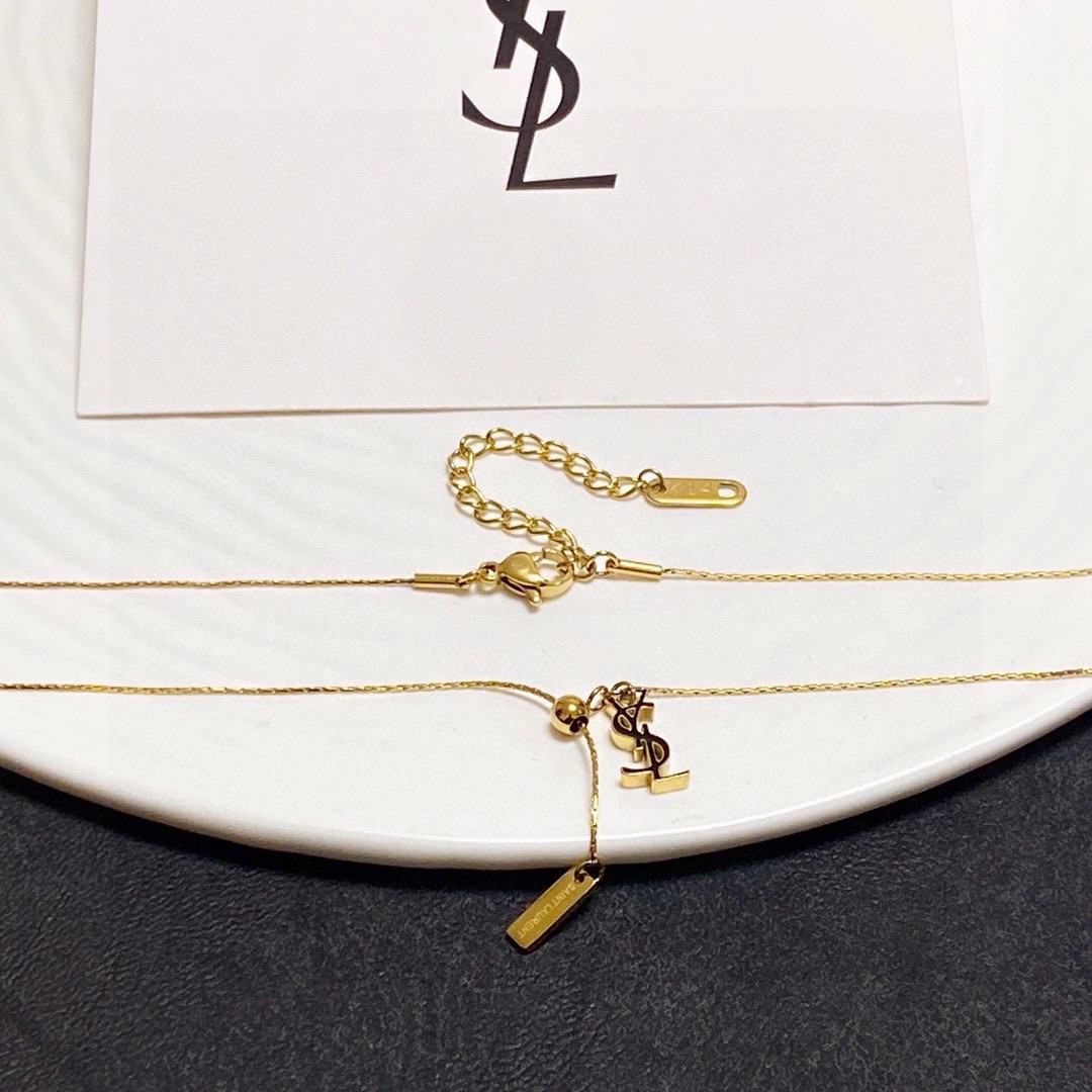Saint Laurent Cassandre YSL Logo Lariat necklace gold-tone metal with dark-tone logo accent 45cm with 5cm extender