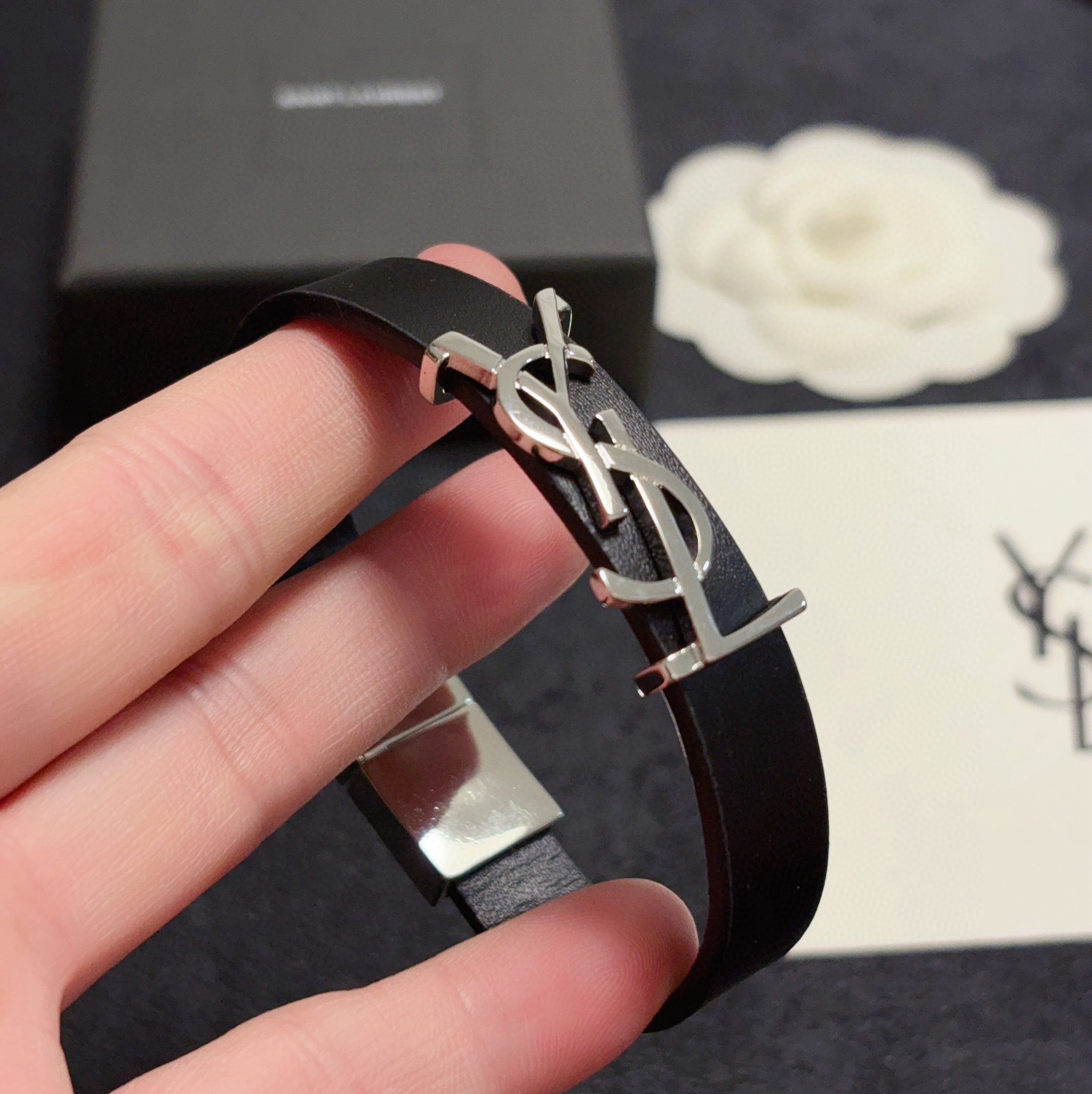 Saint Laurent Cassandre YSL Logo Leather Bracelet bracelet Black leather with silver-tone metal hardware variant with gold-tone metal hardware available 19cm