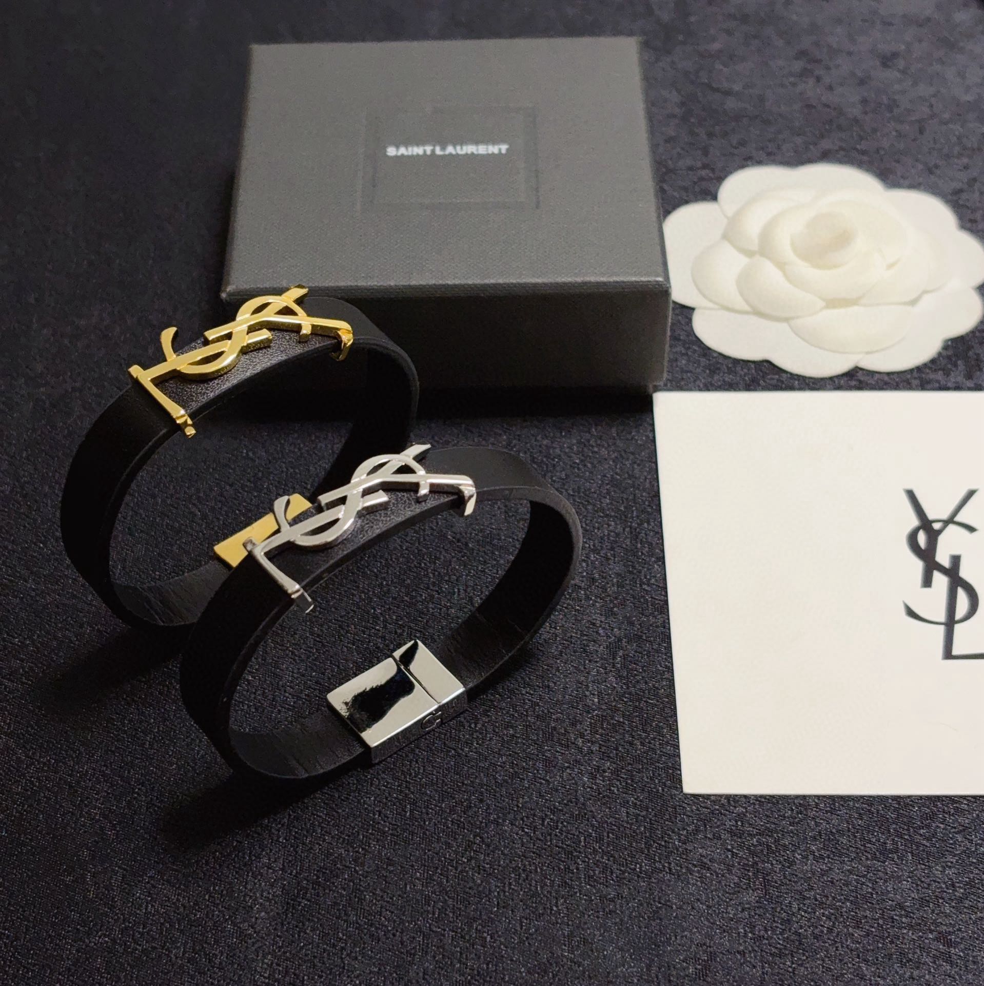 Saint Laurent Cassandre YSL Logo Leather Bracelet bracelet Black leather with silver-tone metal hardware variant with gold-tone metal hardware available 19cm