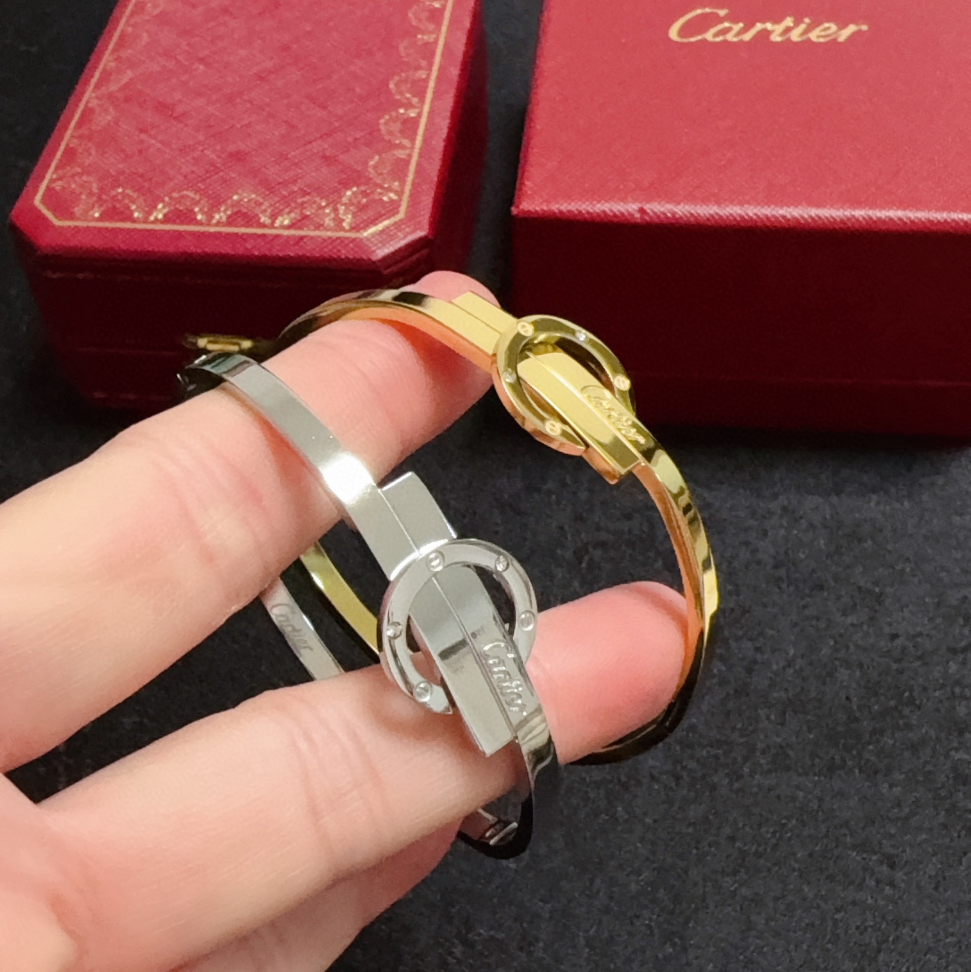 Cartier Love Signature Interlocking Bangle bracelet 18k yellow gold with clear diamond accents 17cm