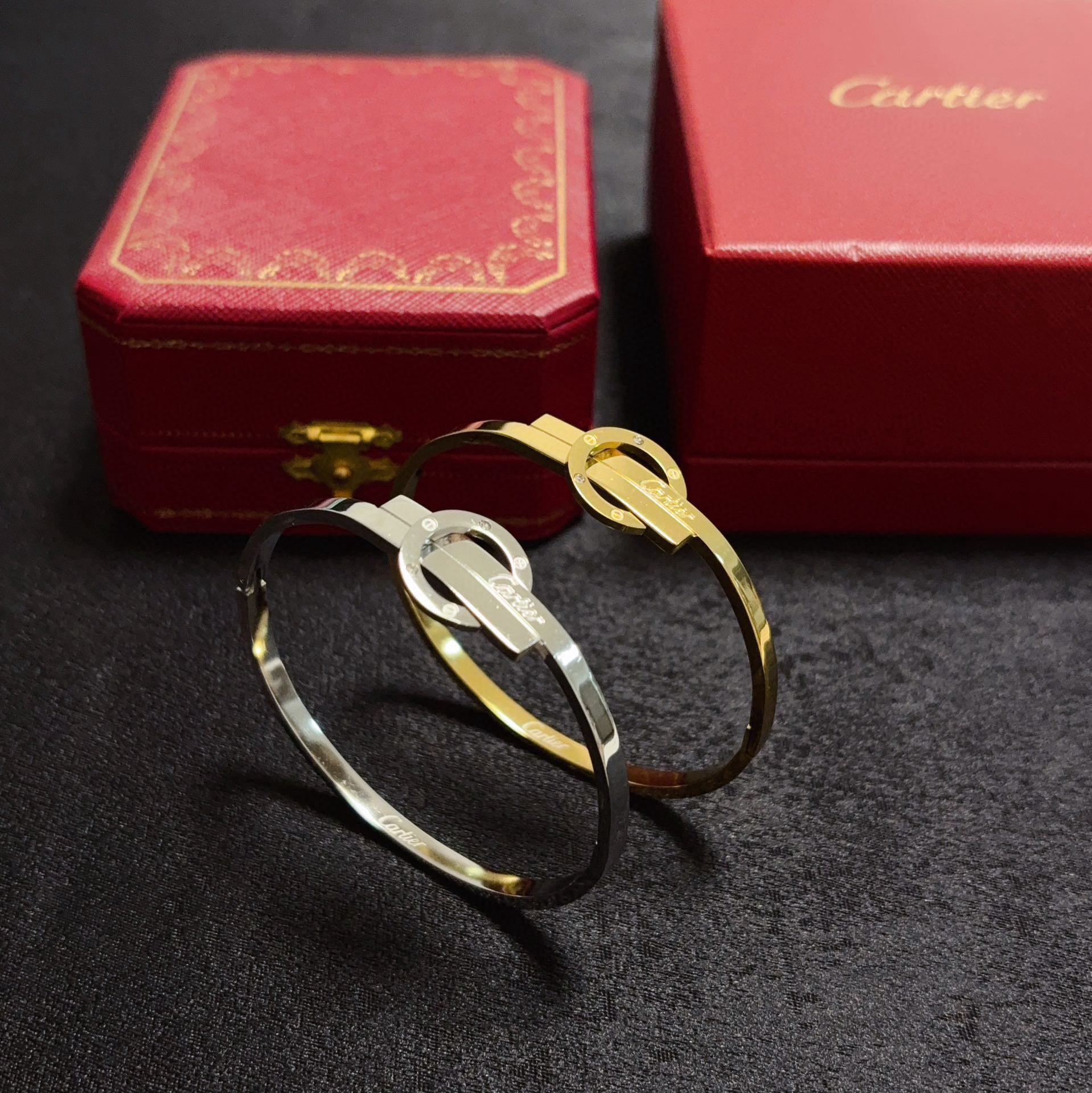 Cartier Love Signature Interlocking Bangle bracelet 18k yellow gold with clear diamond accents 17cm