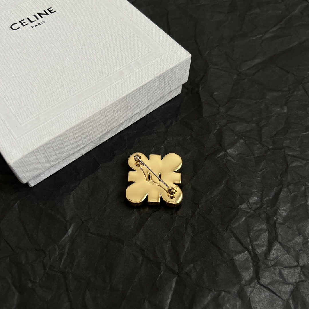 Celine Triomphe Crystal Flower brooch gold-tone metal with clear faceted crystals 2 5cm diameter