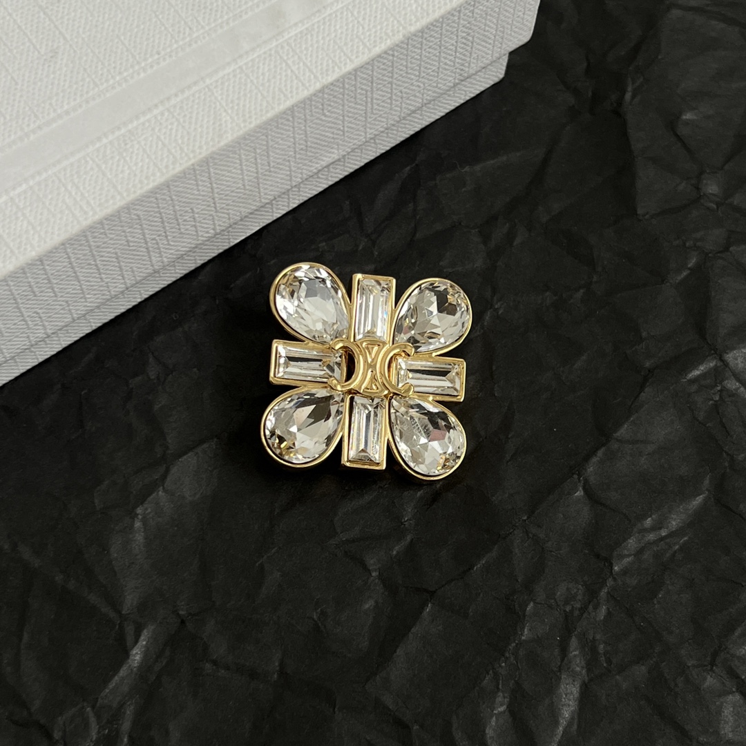 Celine Triomphe Crystal Flower brooch gold-tone metal with clear faceted crystals 2 5cm diameter