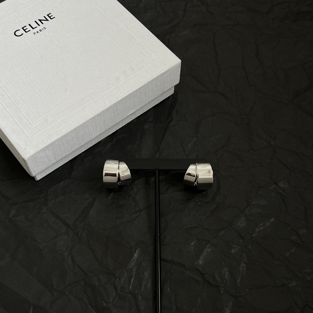 Celine Twisted Cuff Clip-On Earrings earrings silver-tone polished metal no gemstones 1 5cm width