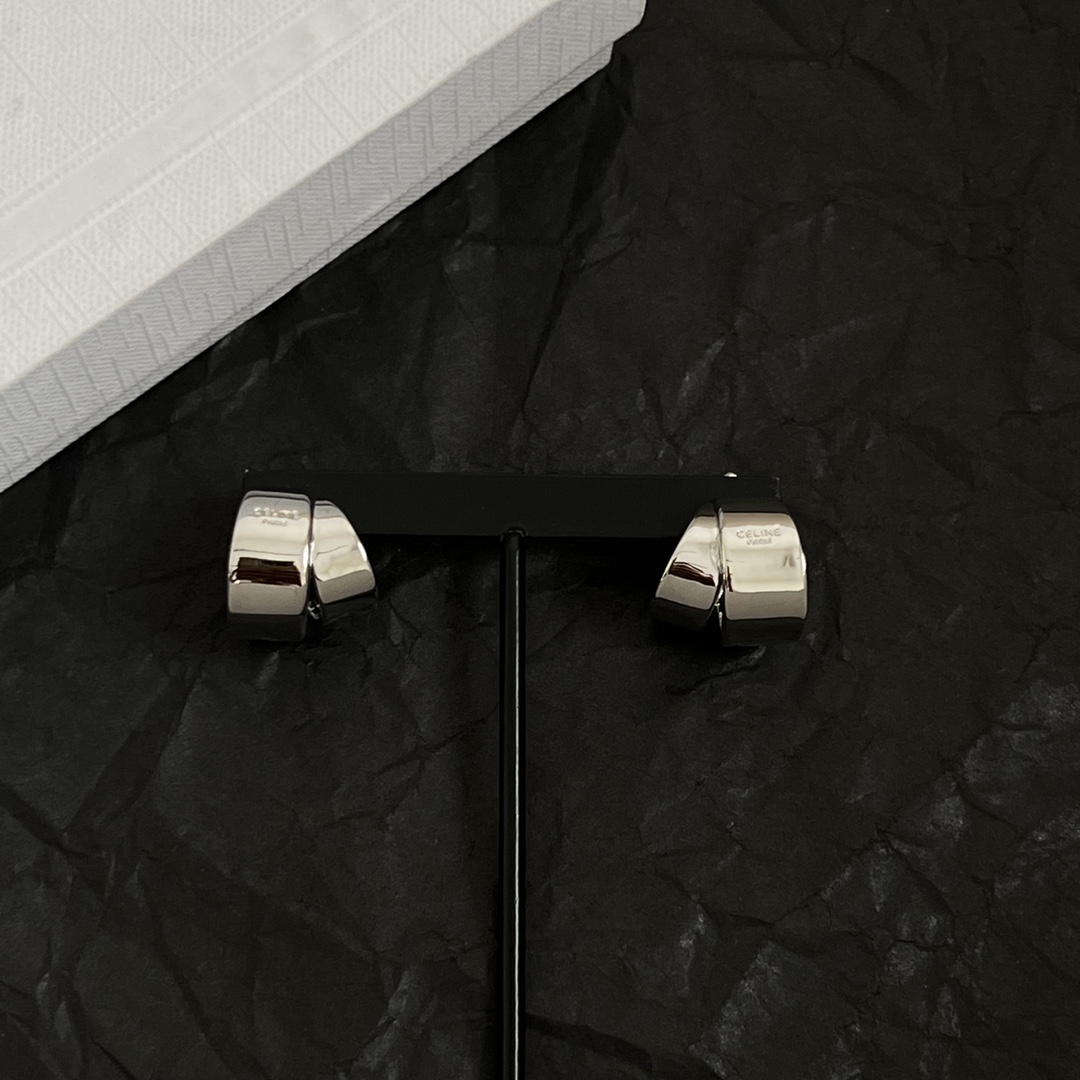Celine Twisted Cuff Clip-On Earrings earrings silver-tone polished metal no gemstones 1 5cm width