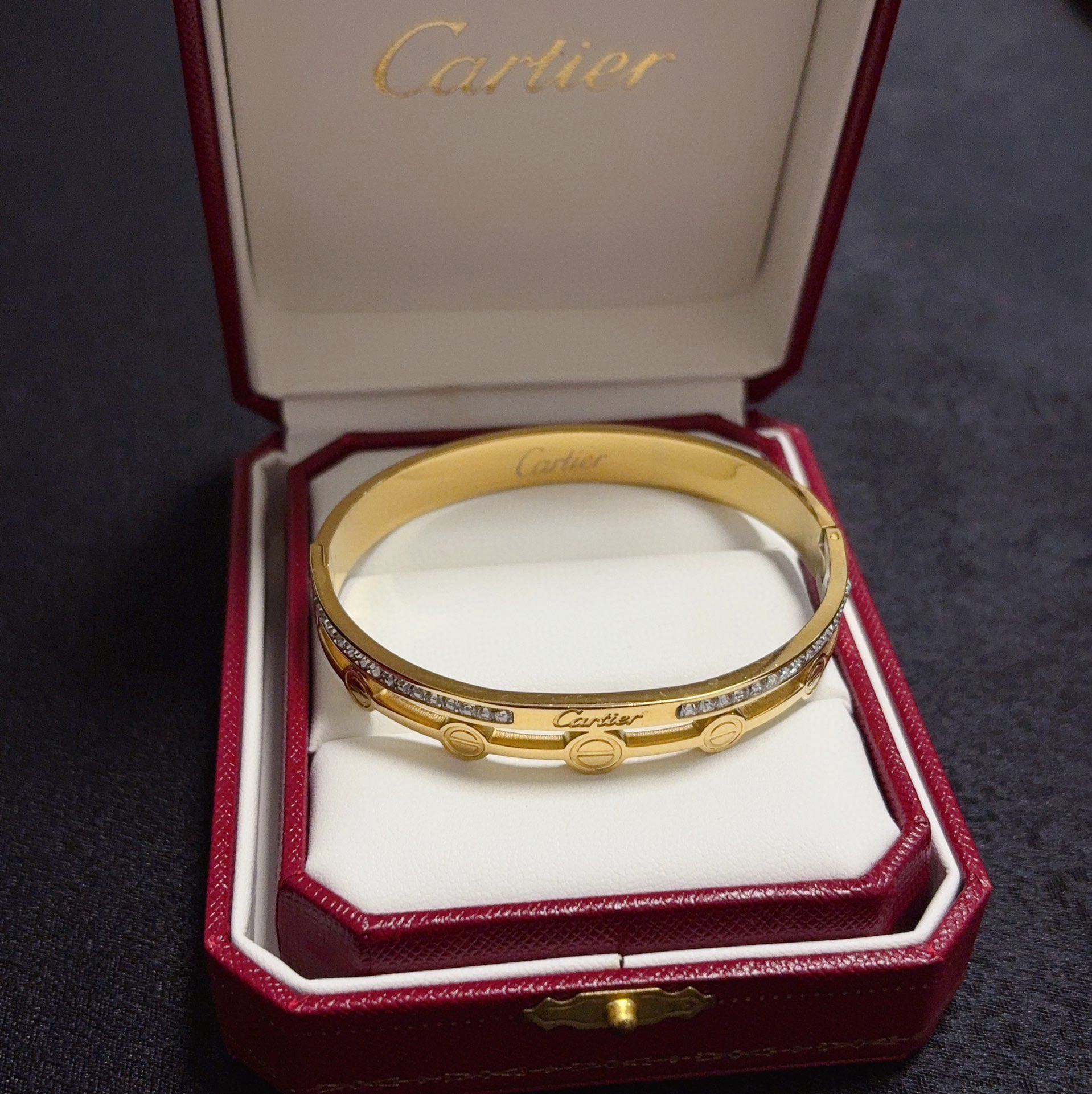 Cartier Love bracelet 18k yellow gold with clear diamond accents 18k white gold with clear diamond accents 17