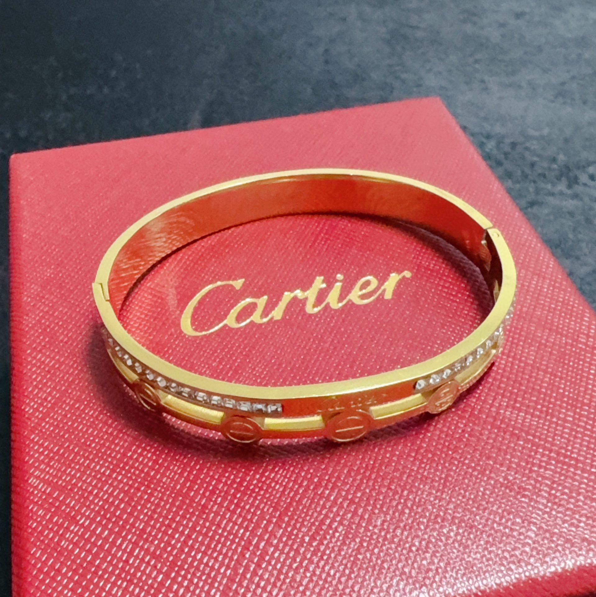 Cartier Love bracelet 18k yellow gold with clear diamond accents 18k white gold with clear diamond accents 17