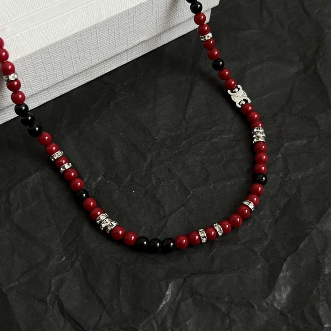 Celine Triomphe Beaded Necklace necklace Silver-toned metal with red and black beads accented with clear crystal rhinestones 45cm with 5cm extender chain